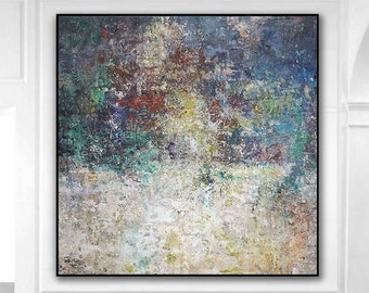 May include: Abstract painting with a textured, layered look. The painting features shades of blue, green, white, and brown. The painting is framed in black and is hanging on a white wall.