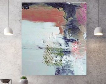 May include: Abstract painting with a white background and splashes of pink, green, and blue paint. The painting has a textured surface and a geometric pattern in the center.