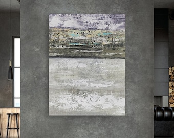 May include: Abstract painting with layers of gray, white, and purple paint. The painting is hung on a gray wall in a modern interior.