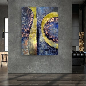 May include: Abstract painting with blue, gold, and copper tones. The painting features a series of overlapping circles and lines.