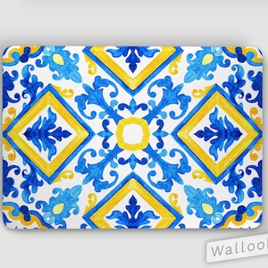 May include: Blue and yellow geometric pattern laptop skin with a white background. The pattern is reminiscent of traditional Portuguese tiles.
