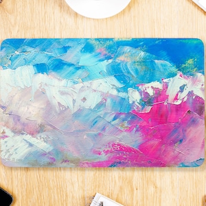 May include: Abstract painting with blue, pink, white, and purple colors. The painting has a textured look, like it was created with a brush.