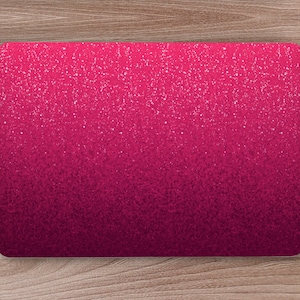 May include: A pink and purple glitter mouse mat with a gradient effect. The mouse mat is rectangular and has a smooth surface.