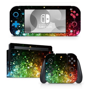 May include: A colorful Nintendo Switch console skin with a galaxy-like design featuring a rainbow of colors and sparkling lights. The skin is designed to fit the Nintendo Switch console, Joy-Cons, and dock.