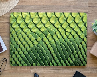 May include: Green snakeskin laptop skin with a textured pattern. The skin is a light green colour with a darker green pattern.