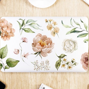 May include: A white laptop cover with a floral design featuring pink, white, and yellow watercolor flowers and green leaves.