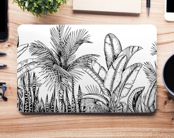 May include: Black and white illustration of tropical plants on a laptop cover. The design features palm trees, banana leaves, and other foliage.