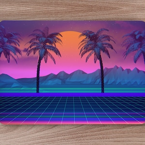 May include: A retro-style illustration of a sunset over a mountain range with palm trees in the foreground. The sky is a gradient of pink, purple, and blue, with a bright orange sun setting in the distance. The ground is a grid pattern of blue and green lines, creating a futuristic feel.