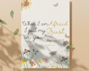 May include: A white card with a floral design and the quote "When I am Afraid I put my Trust in you." Psalms 56:3. The card is on a beige background.