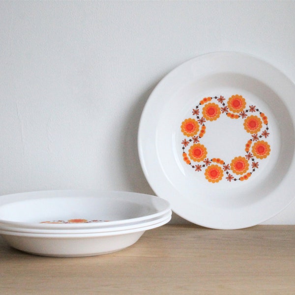 4 French vintage 70s Arcopal Soleil white glass deep plates or soup bowls with an orange floral decor