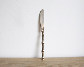 French vintage Mid Century brass butter knife with a faux bamboo handle design