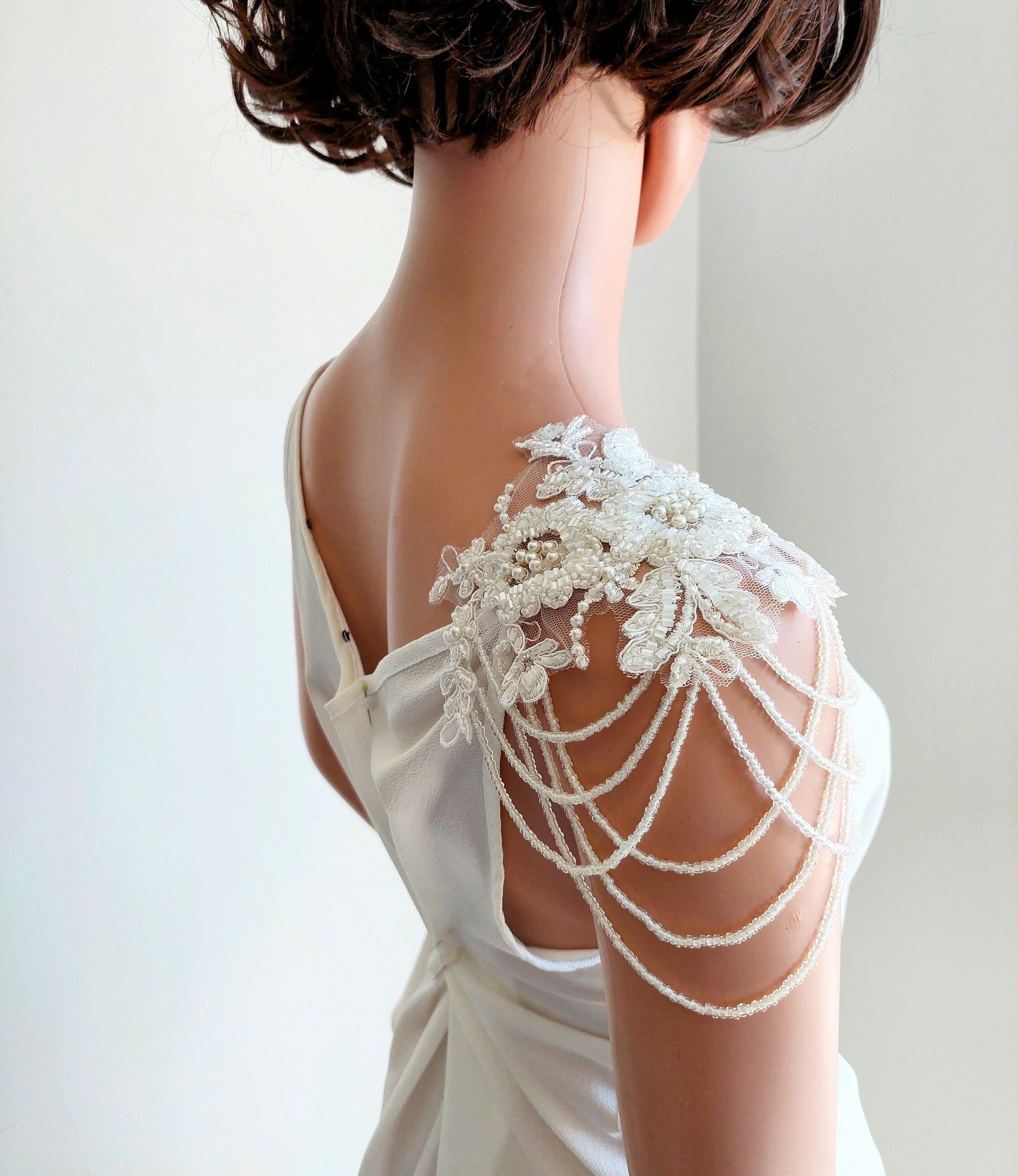 necklace for one shoulder wedding dress How To Choose Your Wedding Jewelry