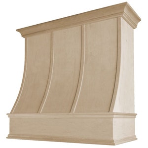 May include: A light wood kitchen range hood with a curved front and three vertical panels. The hood has a decorative trim around the top and bottom.