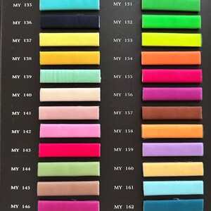 May include: A color chart with 32 fabric swatches, each labeled with a code starting with "MY". The swatches are arranged in two columns, with the codes on the left and the swatches on the right.