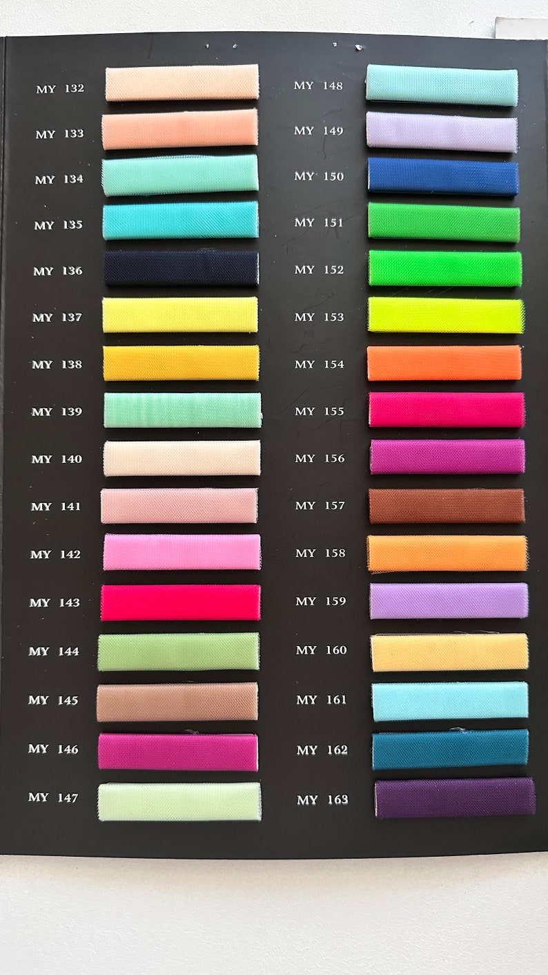 May include: A color chart with 32 fabric swatches, each labeled with a code starting with "MY". The swatches are arranged in two columns, with the codes on the left and the swatches on the right.