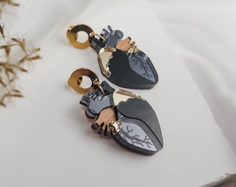 Anatomical Heart Drop Earrings from black and onyx acrylic glass with gold mirror highlights