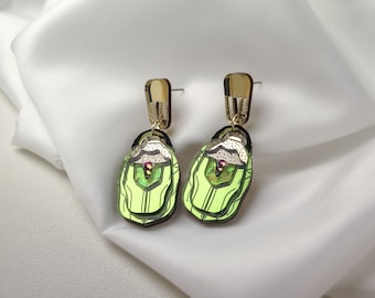 Green Rose Chafer Statement Earrings laser cut from mirror acrylic with tiny rainbow rhinestones