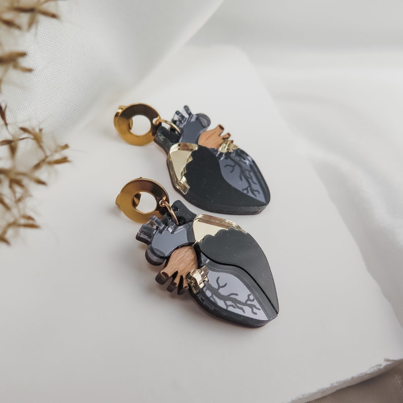 Anatomical Heart Drop Earrings from black and onyx acrylic glass with gold mirror highlights image 1