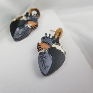 Anatomical Heart Drop Earrings from black and onyx acrylic glass with gold mirror highlights image 5