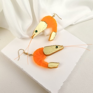 Large Statement Shrimp Dangle Earrings from neon orange acrylic glass with emerald rhinestone eyes and nylon antennas