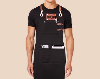 Custom logo apron for men and women with personalized embroidery name tags. Cotton canvas with cross-back leather straps and towel ring.