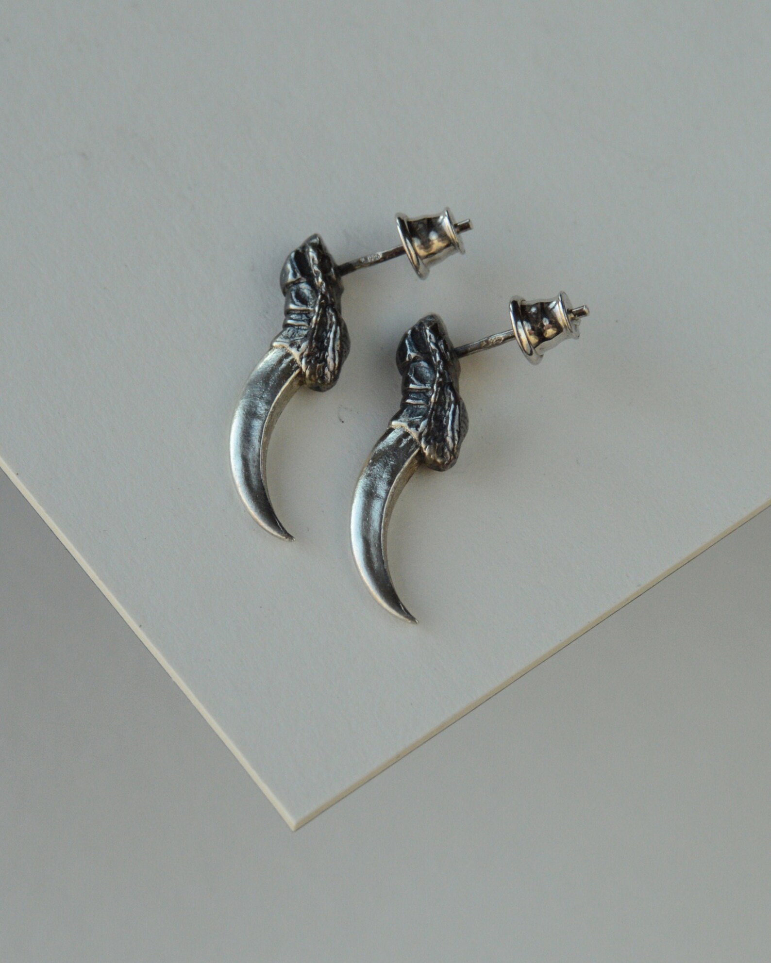 Badass earrings Dragon talon silver studs Villain jewelry | Etsy