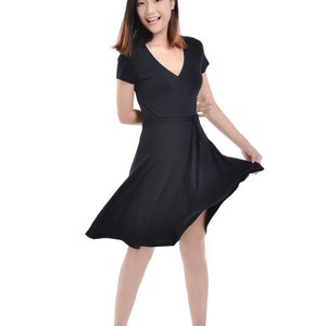 Women’s Little black dress short sleeve v neck circular skirt midi