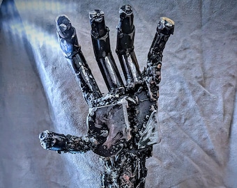 Life sized metal hand sculpture