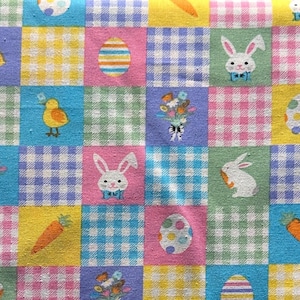 May include: A colorful Easter-themed fabric with a patchwork design. Each square features a gingham pattern in various colors, with illustrations of bunnies, chicks, carrots, eggs, and floral bouquets. The fabric is suitable for spring crafts and decorations.