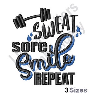 May include: Black and blue embroidery design with the text "Sweat Sore Smile Repeat" and a barbell graphic.