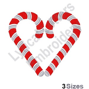 May include: Two red and white candy canes are arranged in a heart shape.