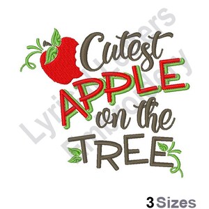 May include: Red apple with a bite taken out of it, with green leaves and the text "Cutest Apple on the Tree" in brown and green lettering.