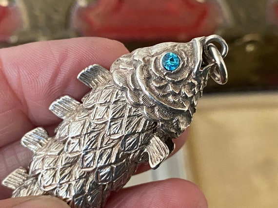Silver articulated fish best sale pendant
