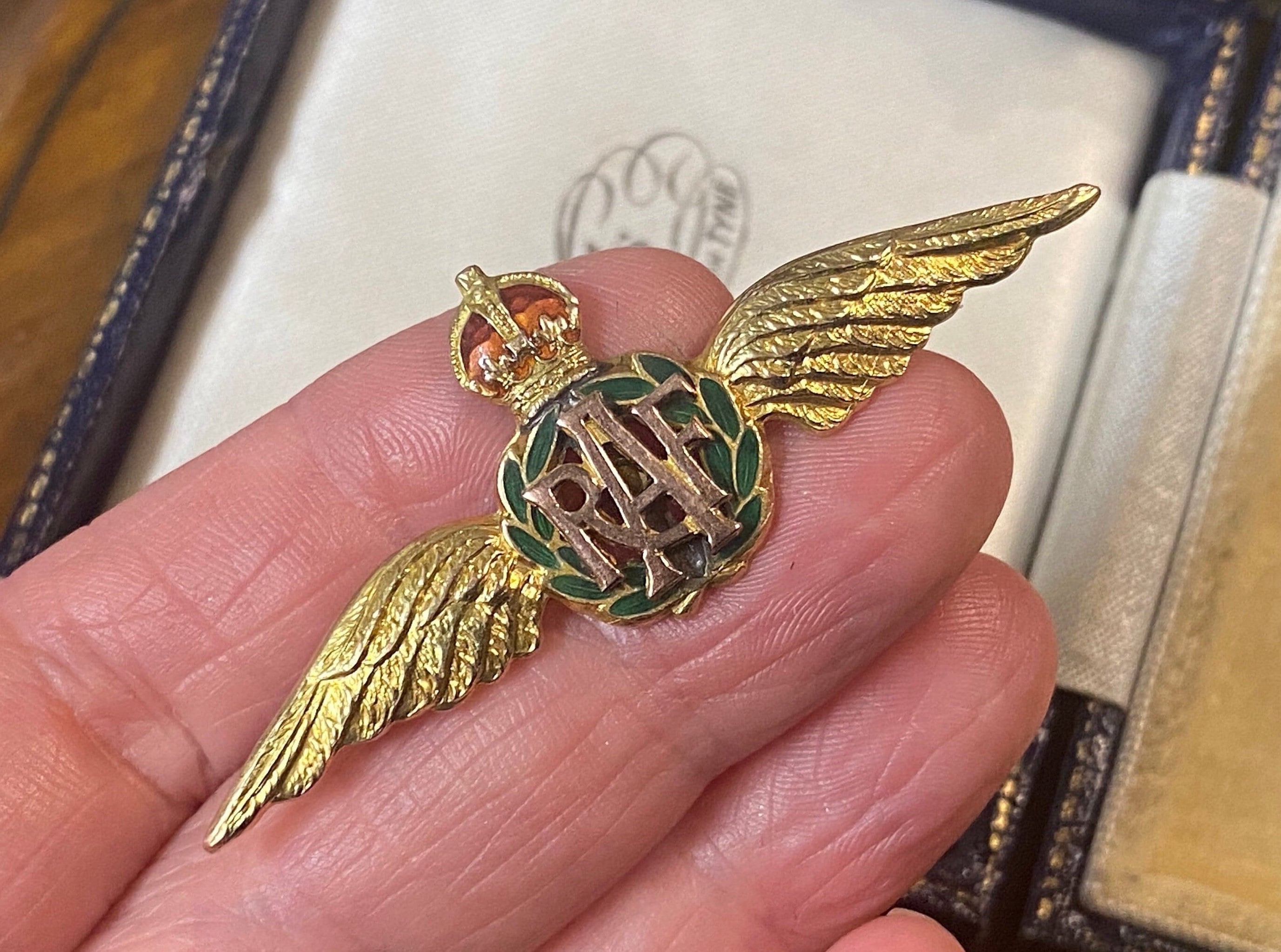 Raf brooch on sale