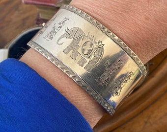 Stunning rare antique Victorian/Edwardian  Sterling silver with engraved Assyrian war elephant & warrior design cuff bangle /bracelet