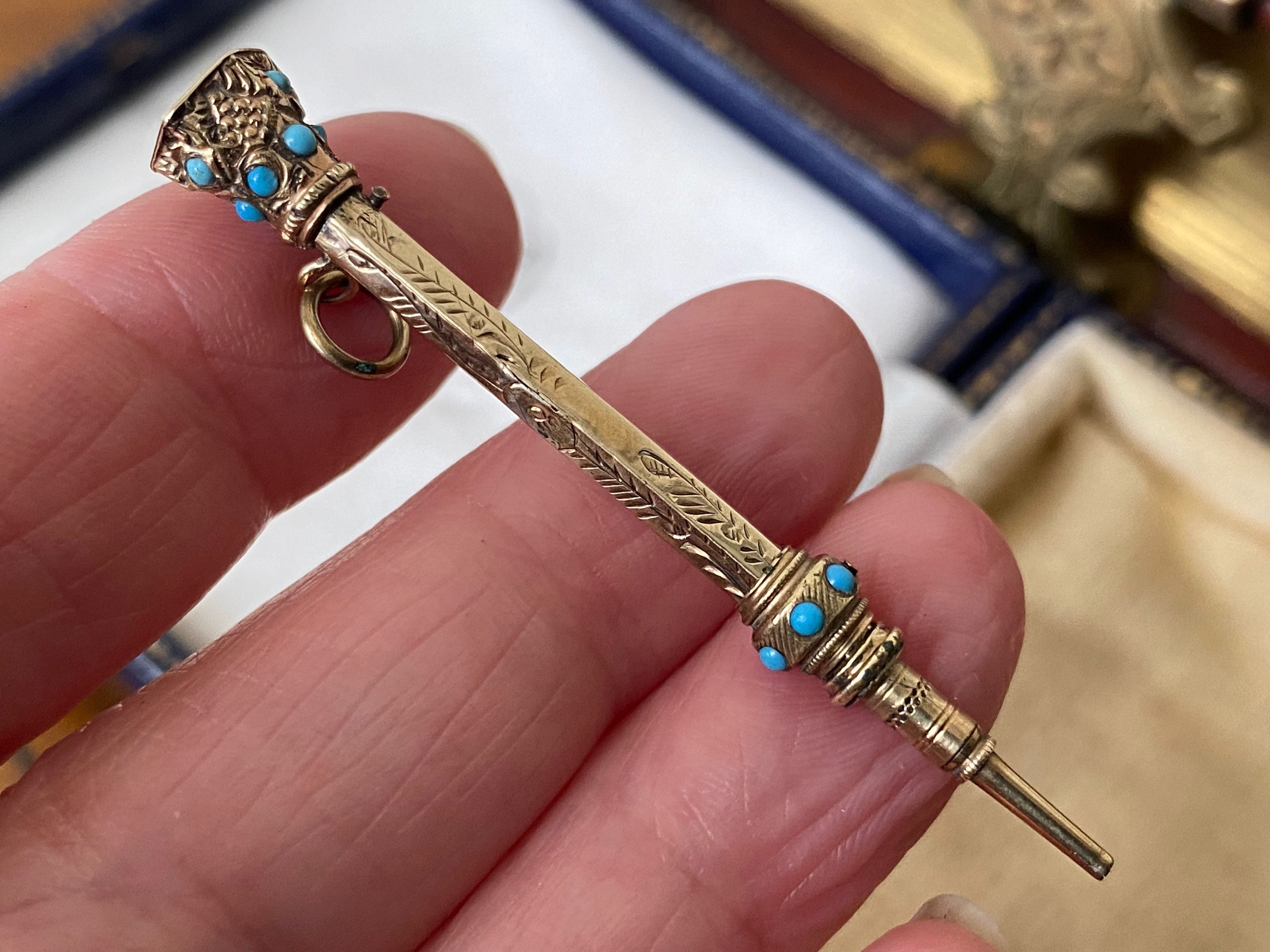Faberge shop pencil necklace