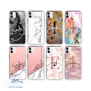 May include: Eight clear phone cases with various designs. The cases feature marble, abstract, and glitter patterns in black, white, pink, and gold. Each case has a name or initial in a stylish font.