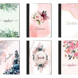 May include: Six different designs of personalised notebook covers. Each cover features a watercolour floral design with a name printed on the front. The names are Amelia, Charlotte, Emma, Sarah, and Sophia.
