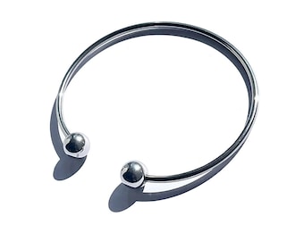 SORRISINO, rigid bracelet in surgical steel