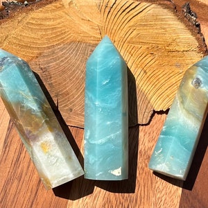 Caribbean calcite crystal tower blue green natural hematite ocean beachy sand sky colors image 8