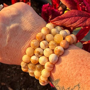 Orange calcite crystal bead bracelet 12mm crystals beads stones bracelets stretchy unisex stone unique jewelry energy creativity sun sacral