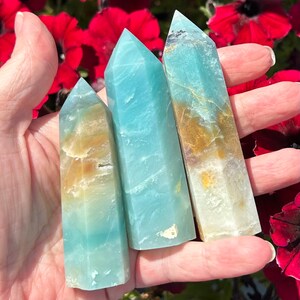 Caribbean calcite crystal tower blue green natural hematite ocean beachy sand sky colors image 1
