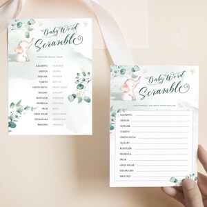 May include: A printable baby shower game with a green and white watercolor background featuring a cute elephant illustration. The game is called "Baby Word Scramble" and asks players to unscramble baby-related words.