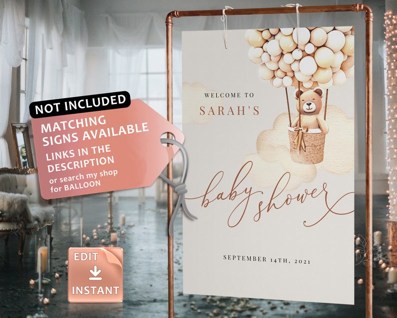 May include: A printable baby shower sign with a watercolor illustration of a teddy bear in a hot air balloon. The sign says "Welcome to Sarah's Baby Shower" and "September 14th, 2021".