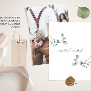 Op de afbeelding: Een witte huwelijksuitnodiging met een aquarel-illustratie van eucalyptus takken en de tekst "rachel & nichol" in cursief.