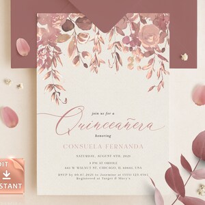 May include: A blush pink and gold Quincea&ntilde;era invitation with floral accents. The invitation reads "Join us for a Quincea&ntilde;era honoring Consuela Fernanda" with the date, time, and location. RSVP information is included at the bottom.