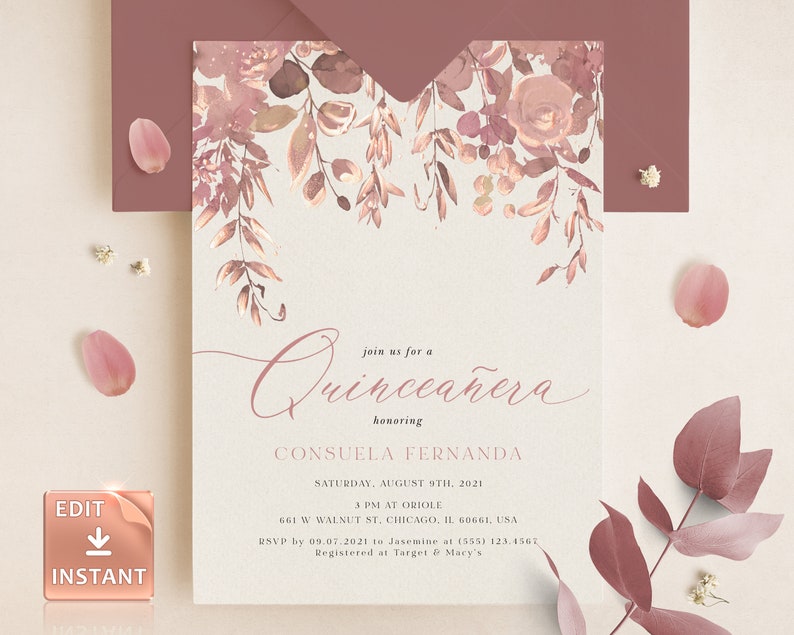May include: A blush pink and gold Quincea&ntilde;era invitation with floral accents. The invitation reads "Join us for a Quincea&ntilde;era honoring Consuela Fernanda" with the date, time, and location. RSVP information is included at the bottom.