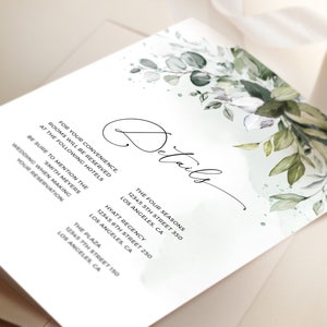 May include: Wedding details card with a watercolor background featuring green leaves and white flowers. The card lists hotel options for guests attending the wedding, including the Four Seasons, Hyatt Regency, and The Plaza, all located in Los Angeles, California.