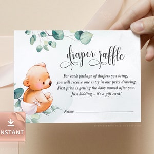 May include: A white card with green leaves and a brown bear illustration. The text "diaper raffle" is written in cursive. The text reads: "For each package of diapers you bring, you will receive one entry in our prize drawing. First prize is getting the baby named after you. Just kidding - it's a gift card!" There is a blank line for a name.
