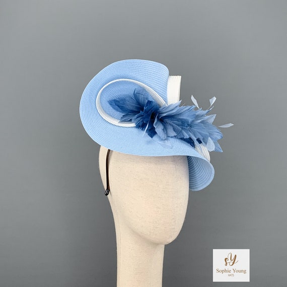 Light Blue Fascinator Hat With White Trim and Feather Flower 